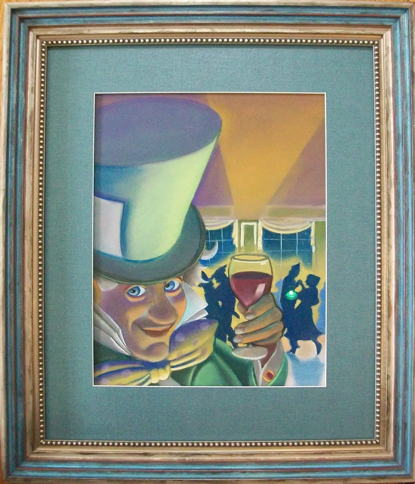 Colorful Mad Hatter print in a sea-green mat and a weathered blue and gold frame